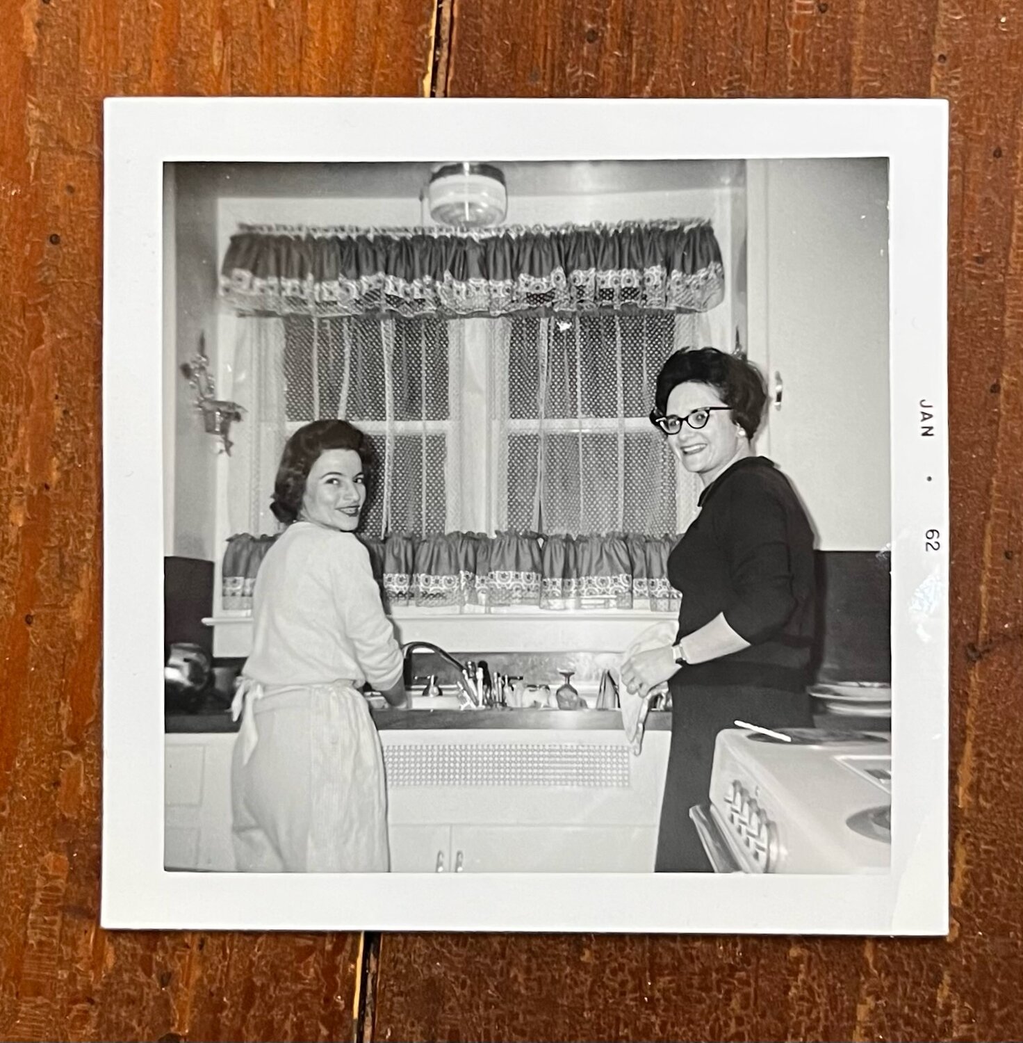 Barbara Fox, left, and my father's sister, Aunt Marcia, looking delighted to be washing dishes after some family get-together in January 1962. I dug this photo up after artist Barbara Winfield's take on women and motherhood in her exhibit titled "Mad Ads and Funny Phrases."